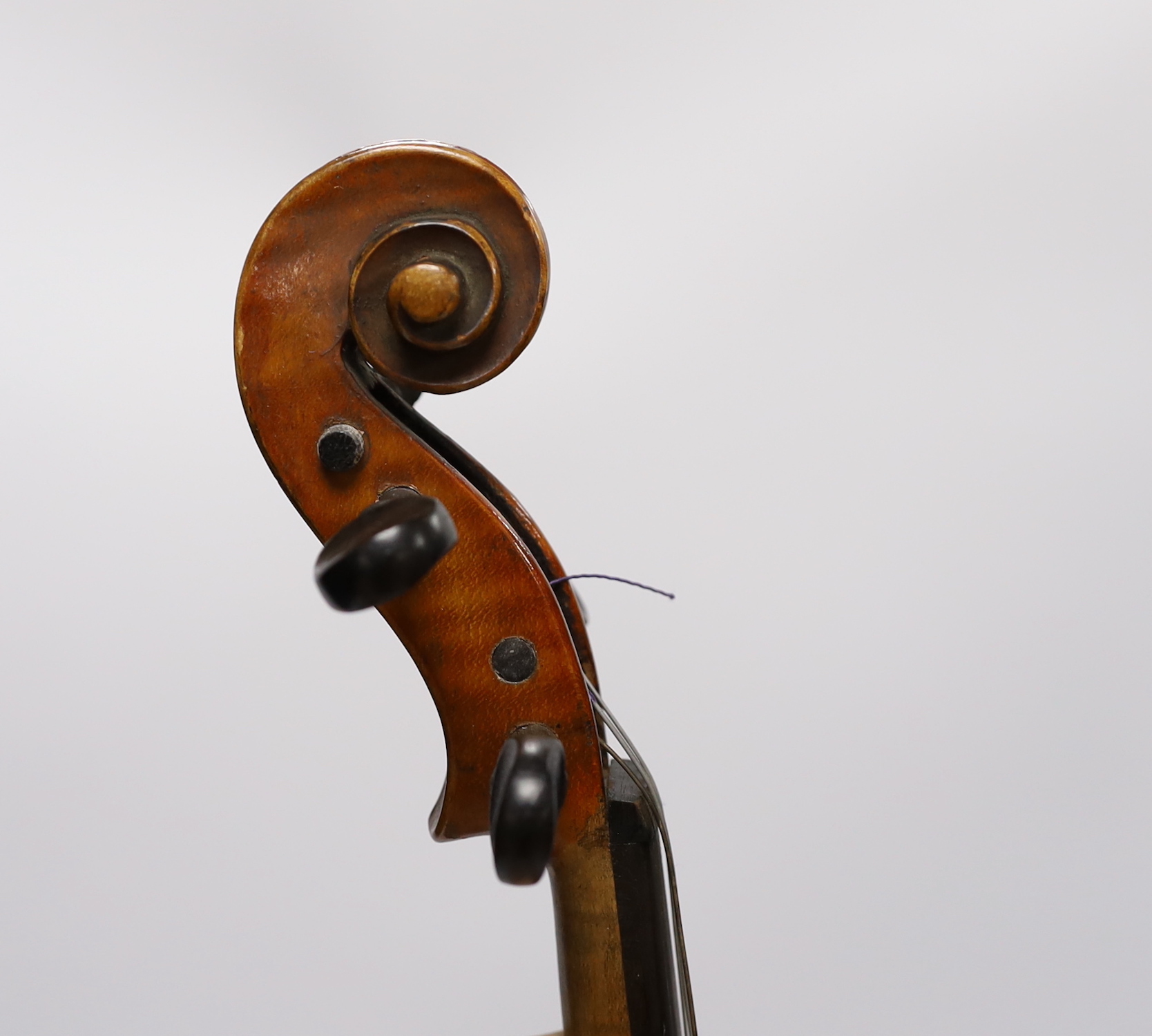 A cased early 20th century French violin, bears Strad label